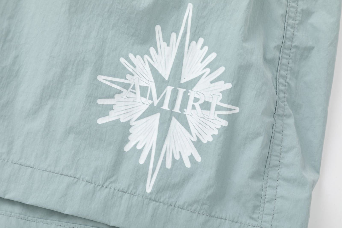 AMIRI Starburst logo shell swim shorts